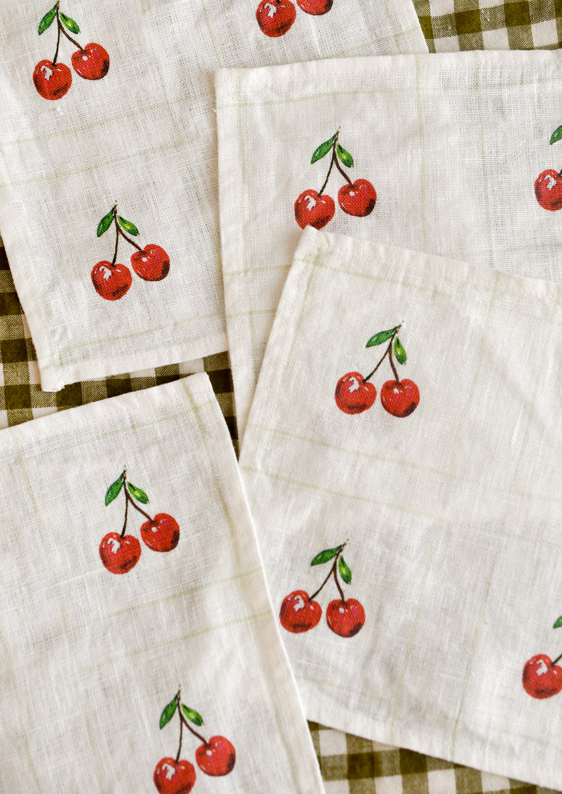 Set of 4 cocktail napkins with cherry pattern.