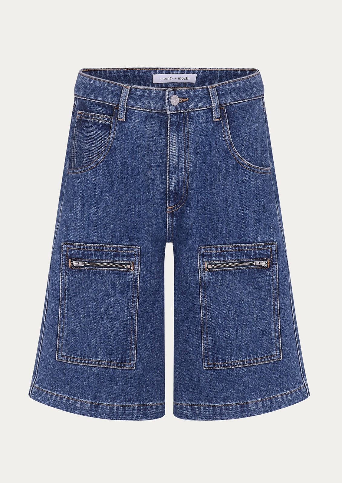 A pair of knee-length denim shorts with zip details on patch pockets.
