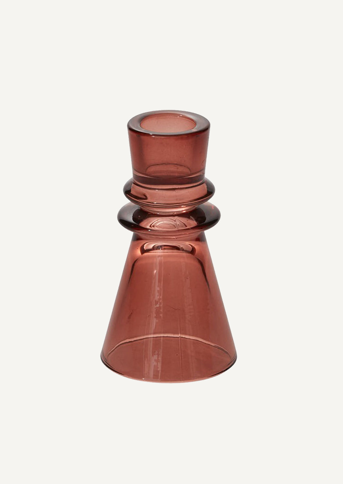 A burgundy colored glass taper candle holders with tapered geometric shape.