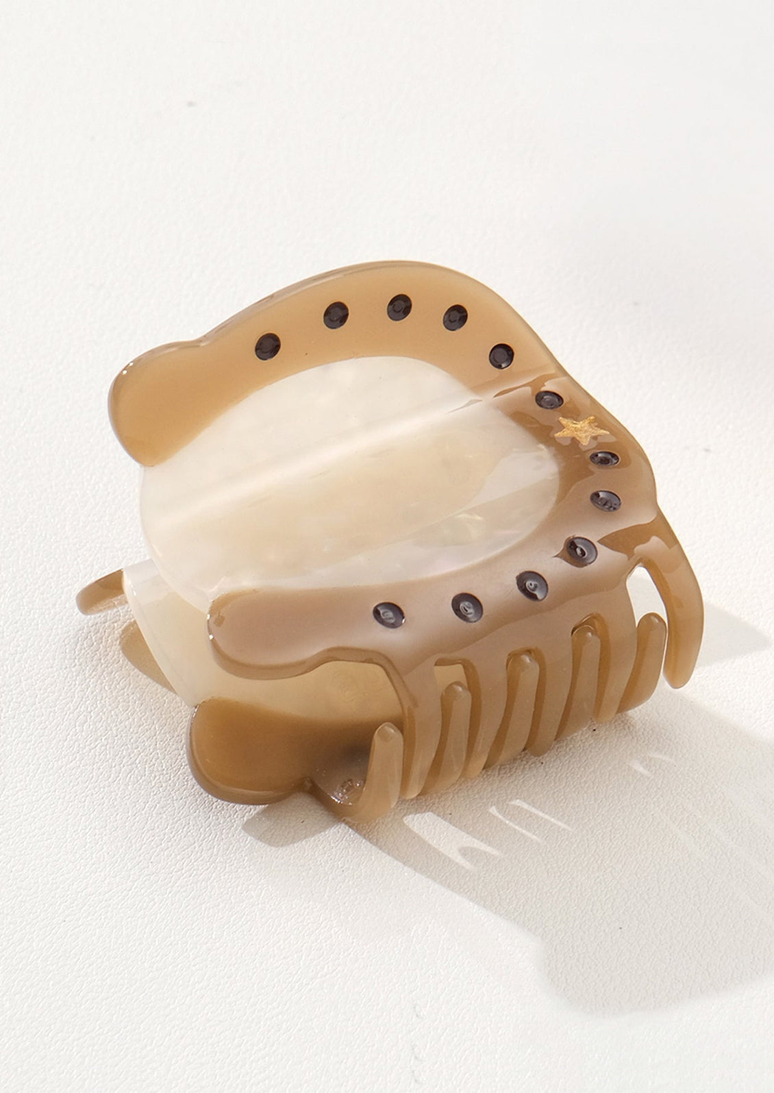 A hair claw shaped like a horseshoe