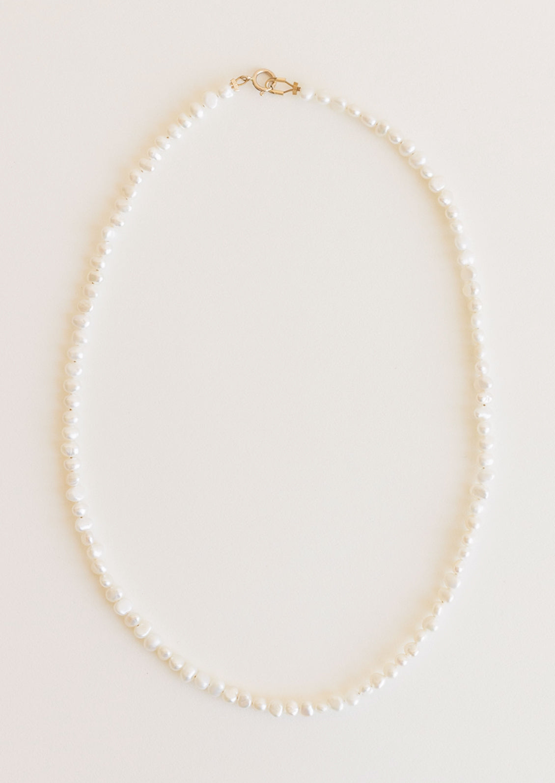 A beaded pearl necklace.