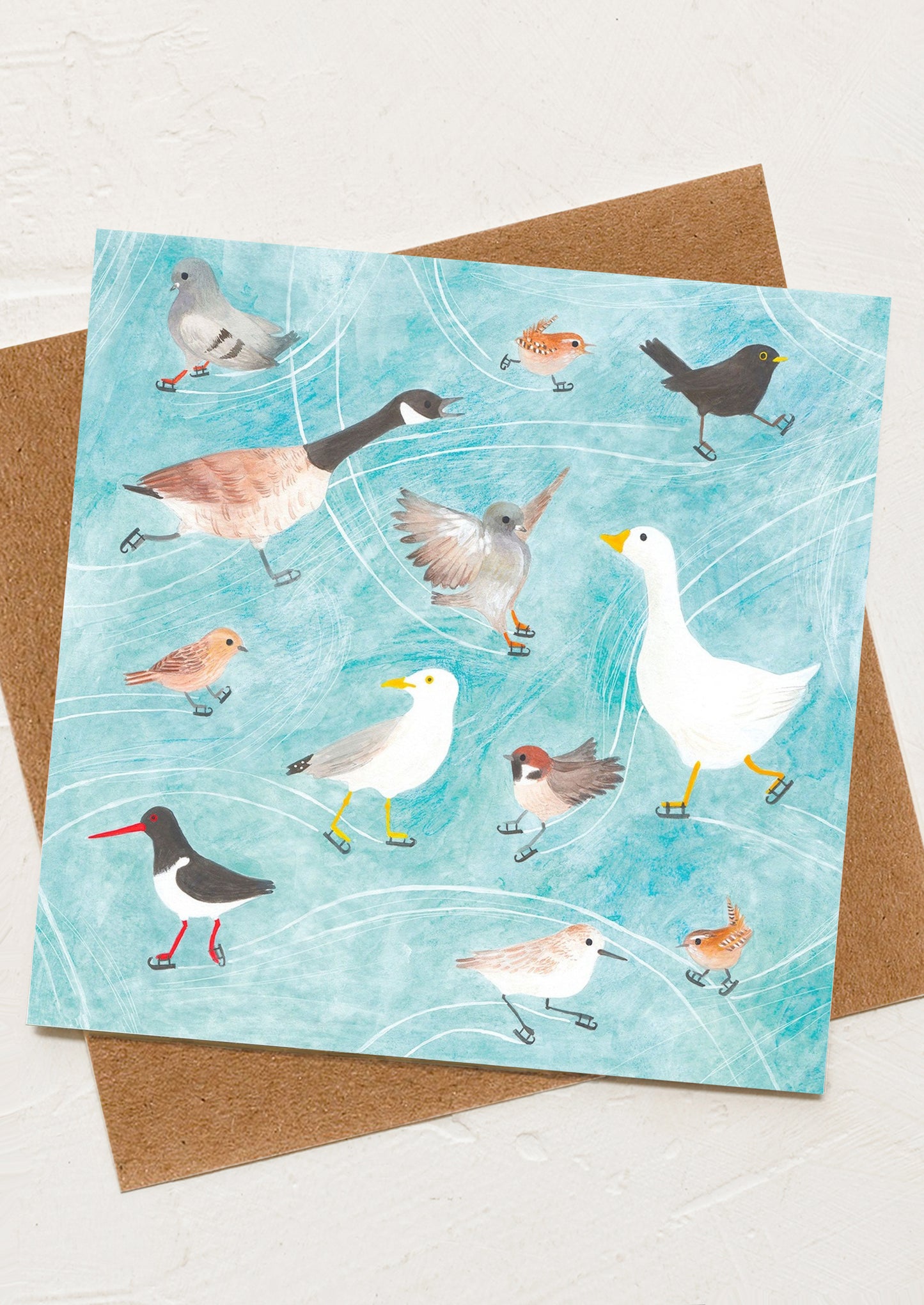 A greeting card with illustration of different birds on ice skates.