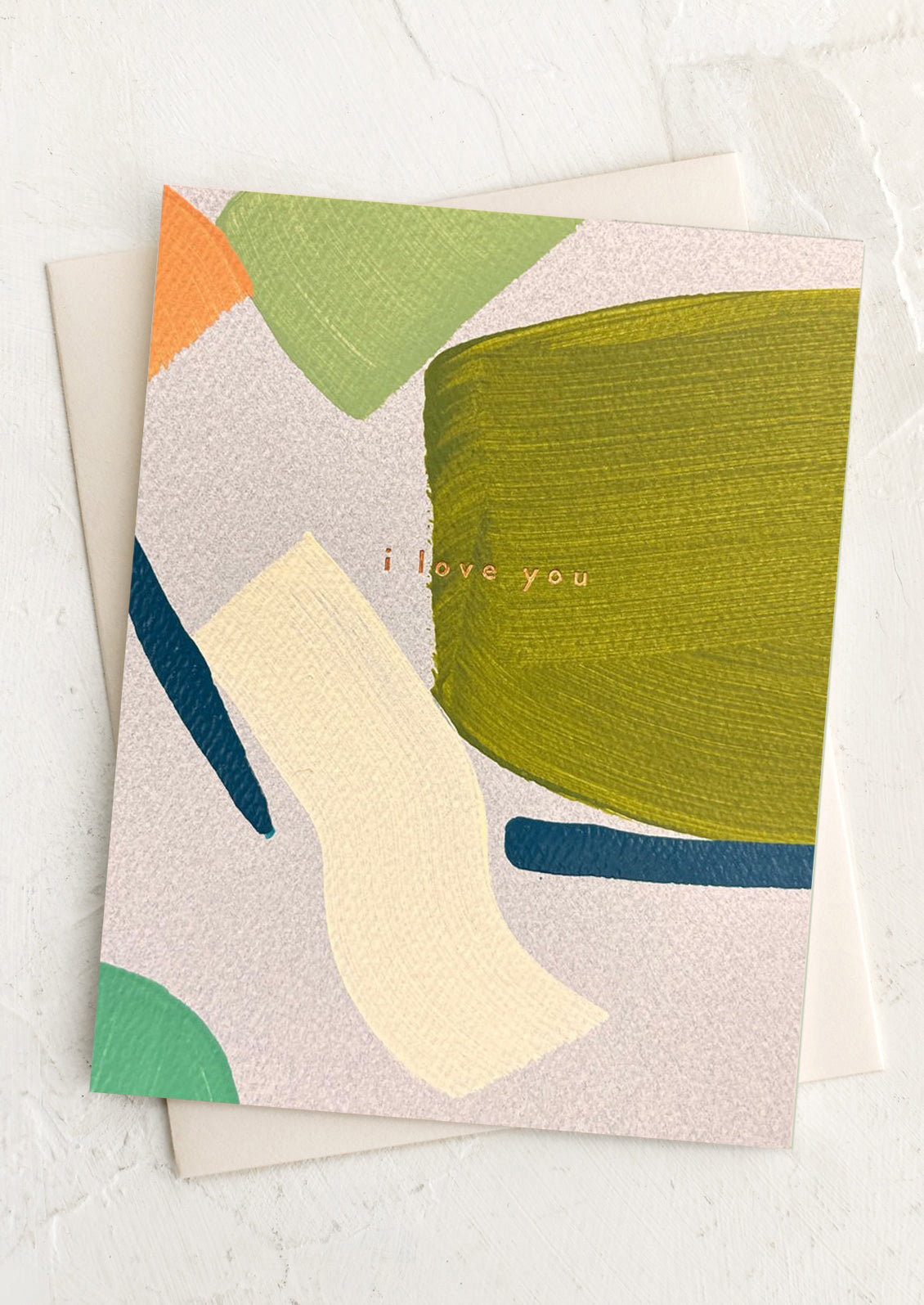 Greeting card with abstract shapes and 'I love you' text on a white background