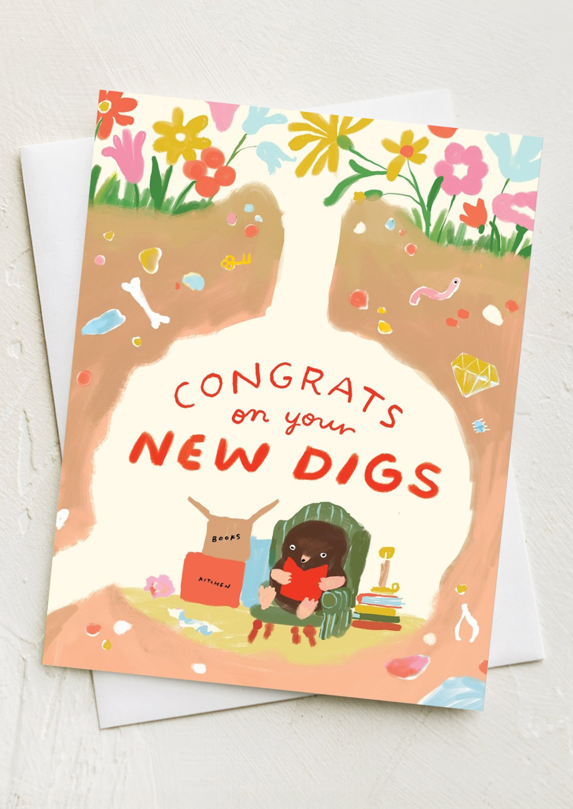 A card with image of badger in hole, text reads "Congrats on your new digs".