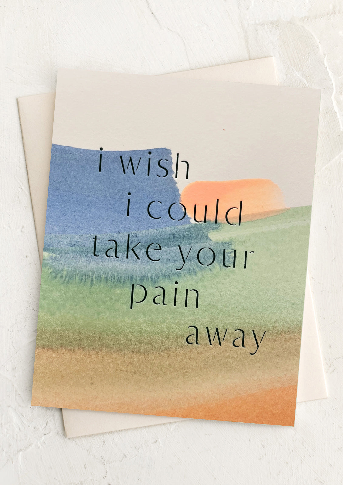 Card with watercolor design and text 'i wish i could take your pain away' on a white background