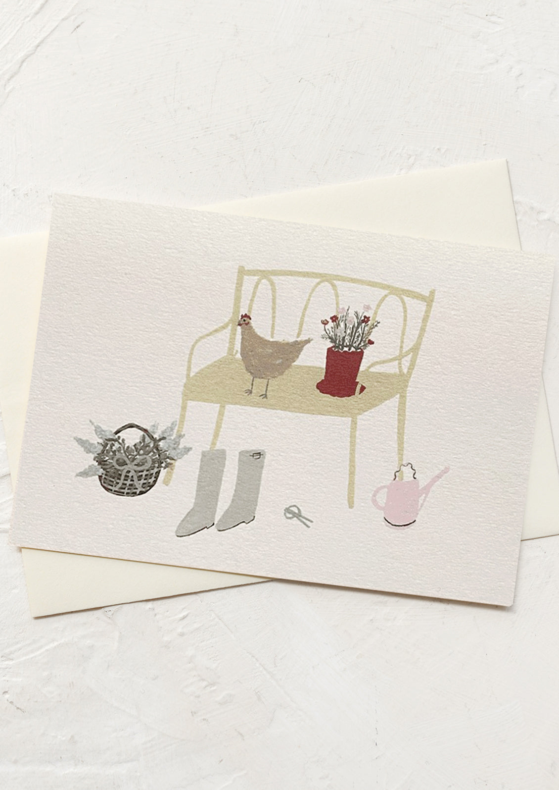 A card with illustration of chicken, and gardening tools around a bench.