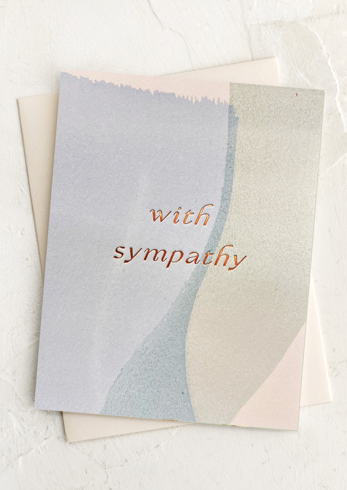 Greeting card with 'with sympathy' text on a watercolor background.
