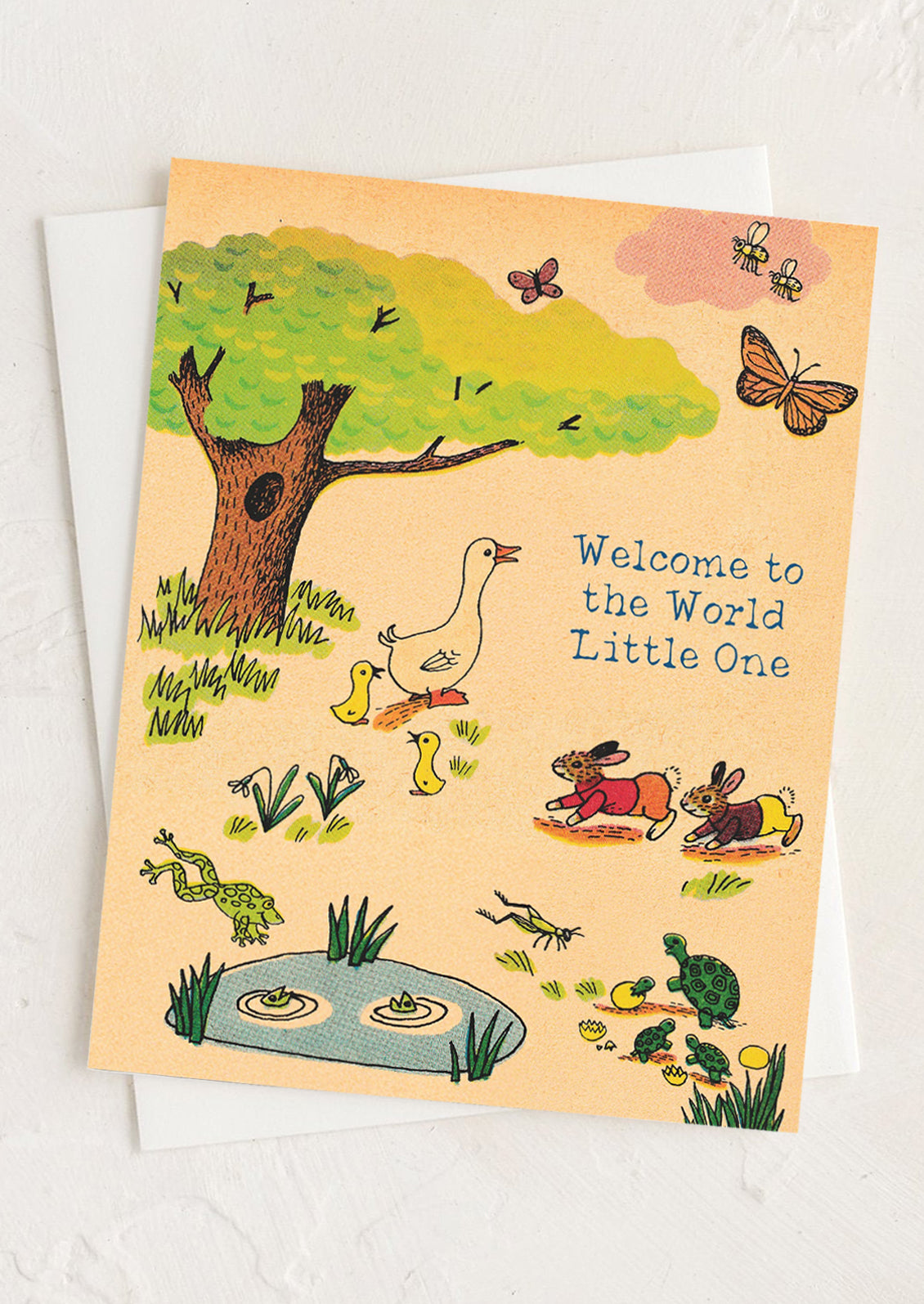 Greeting card with illustrations of animals and text 'Welcome to the World Little One' on a white background.