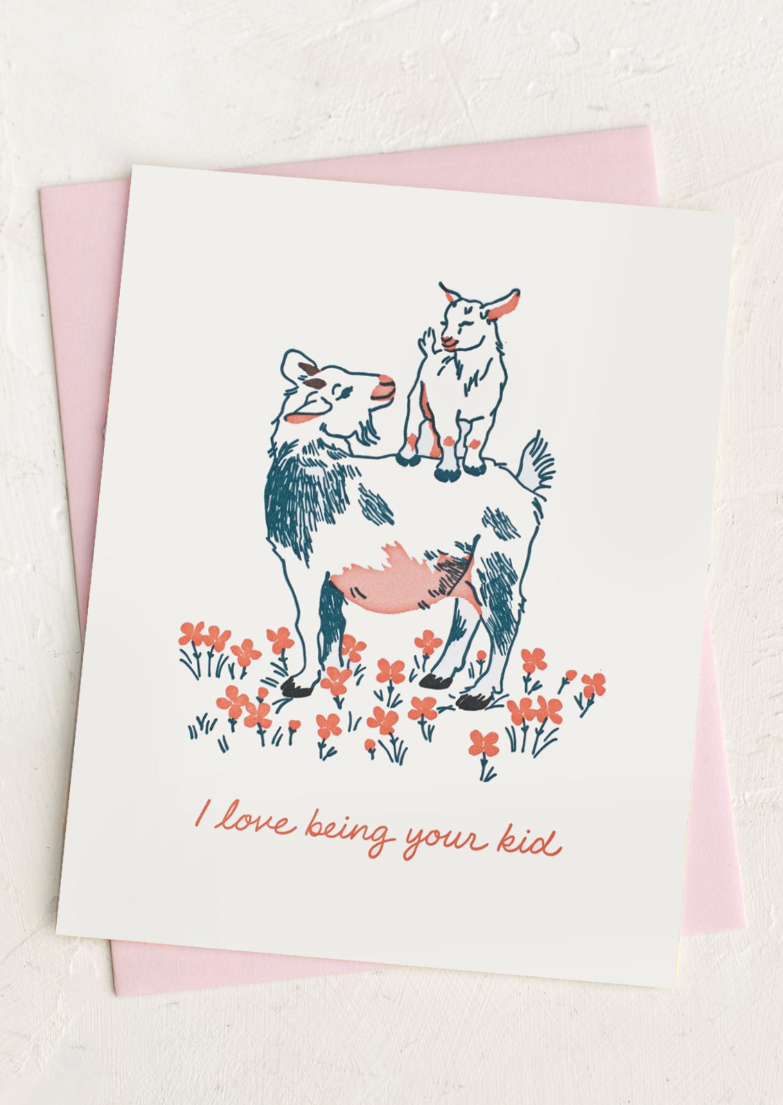 A greeting card with illustration of goats, text reads "I love being your kid".