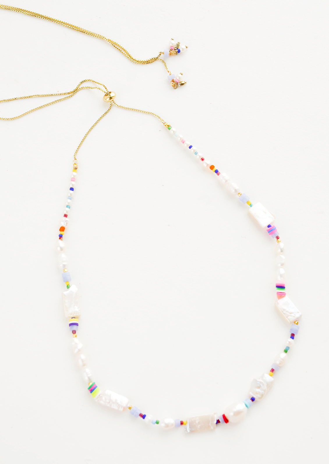 Beaded necklace with a mix of beads with long adjustable gold box chain