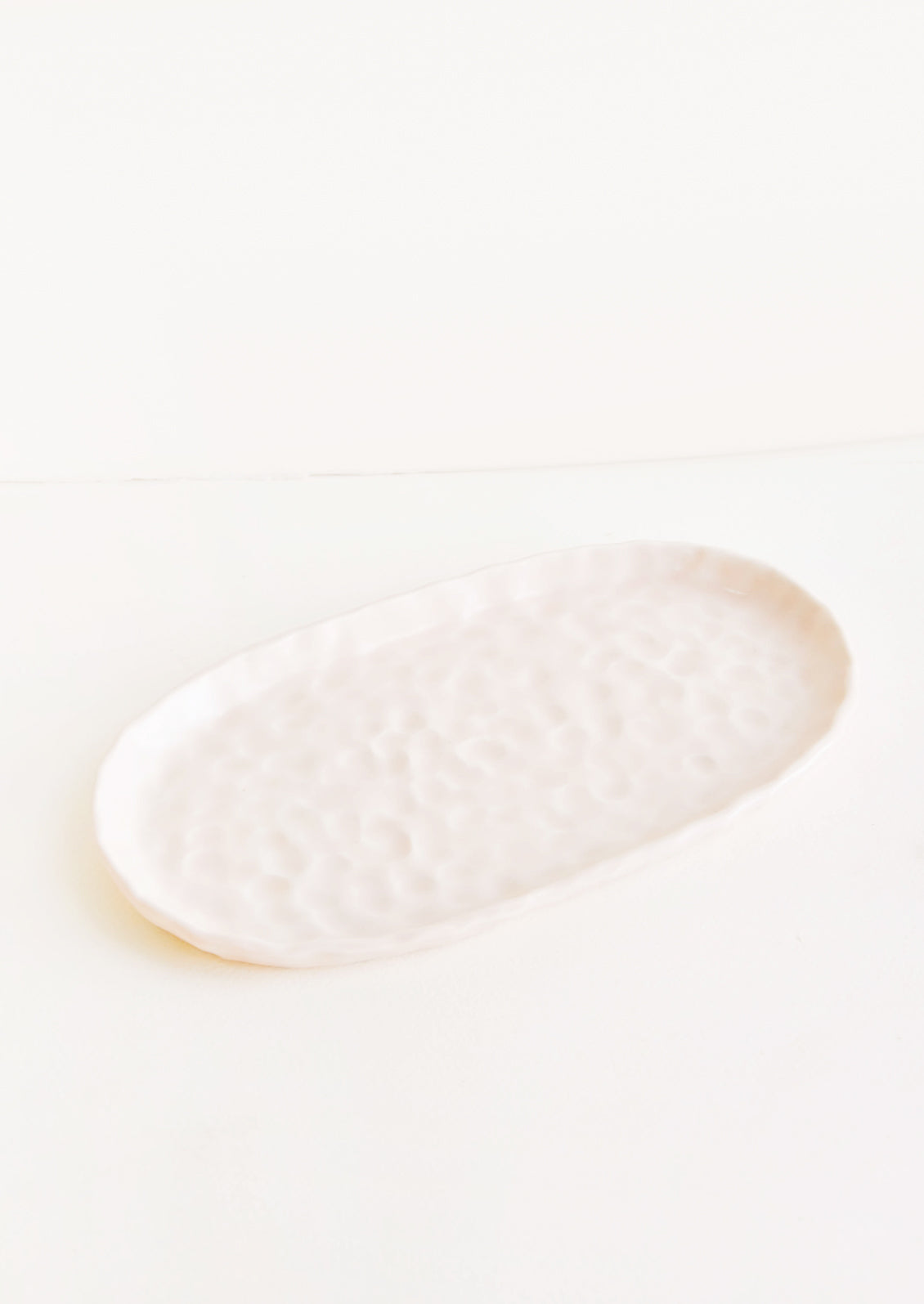 Dapple Textured Oval Shaped Ceramic Trays in Pale Pink - LEIF