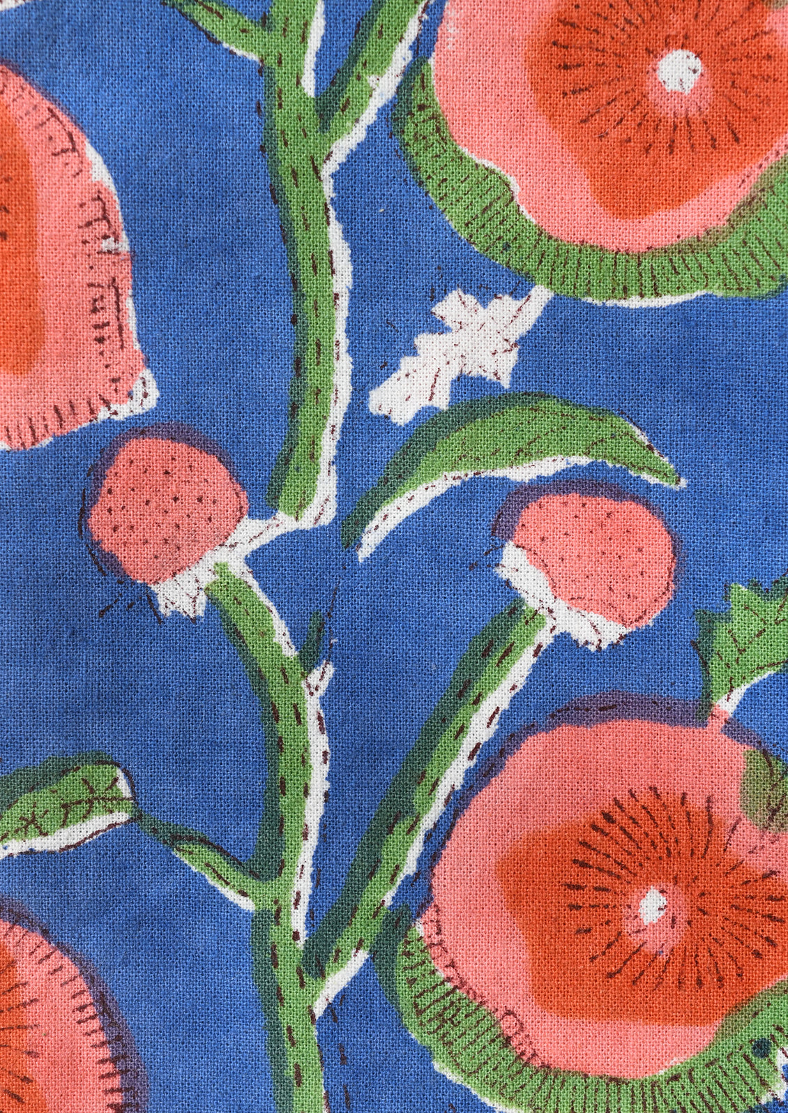 Close-up of fabric with floral pattern on a blue background