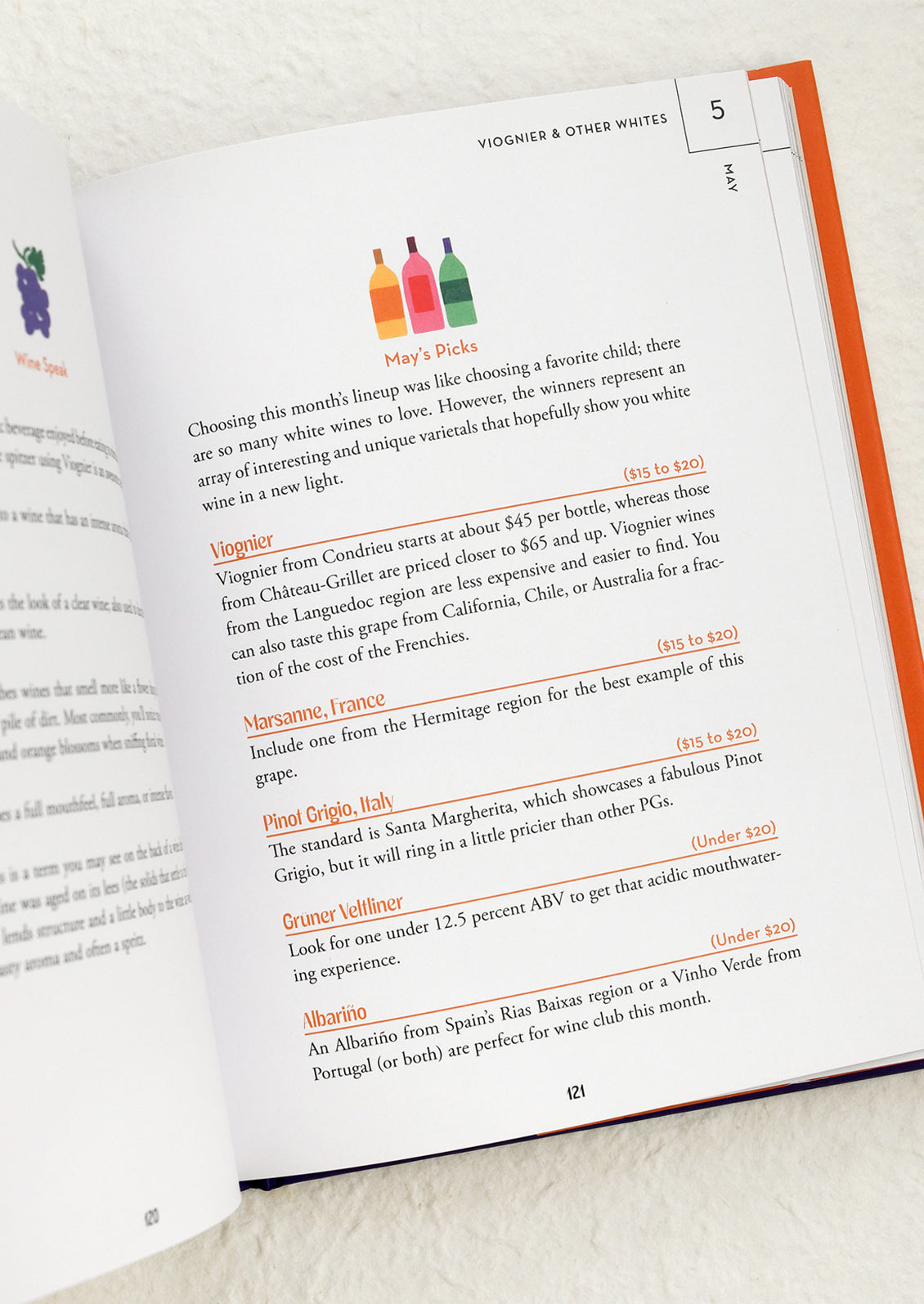 Open book page with descriptions of wine types.