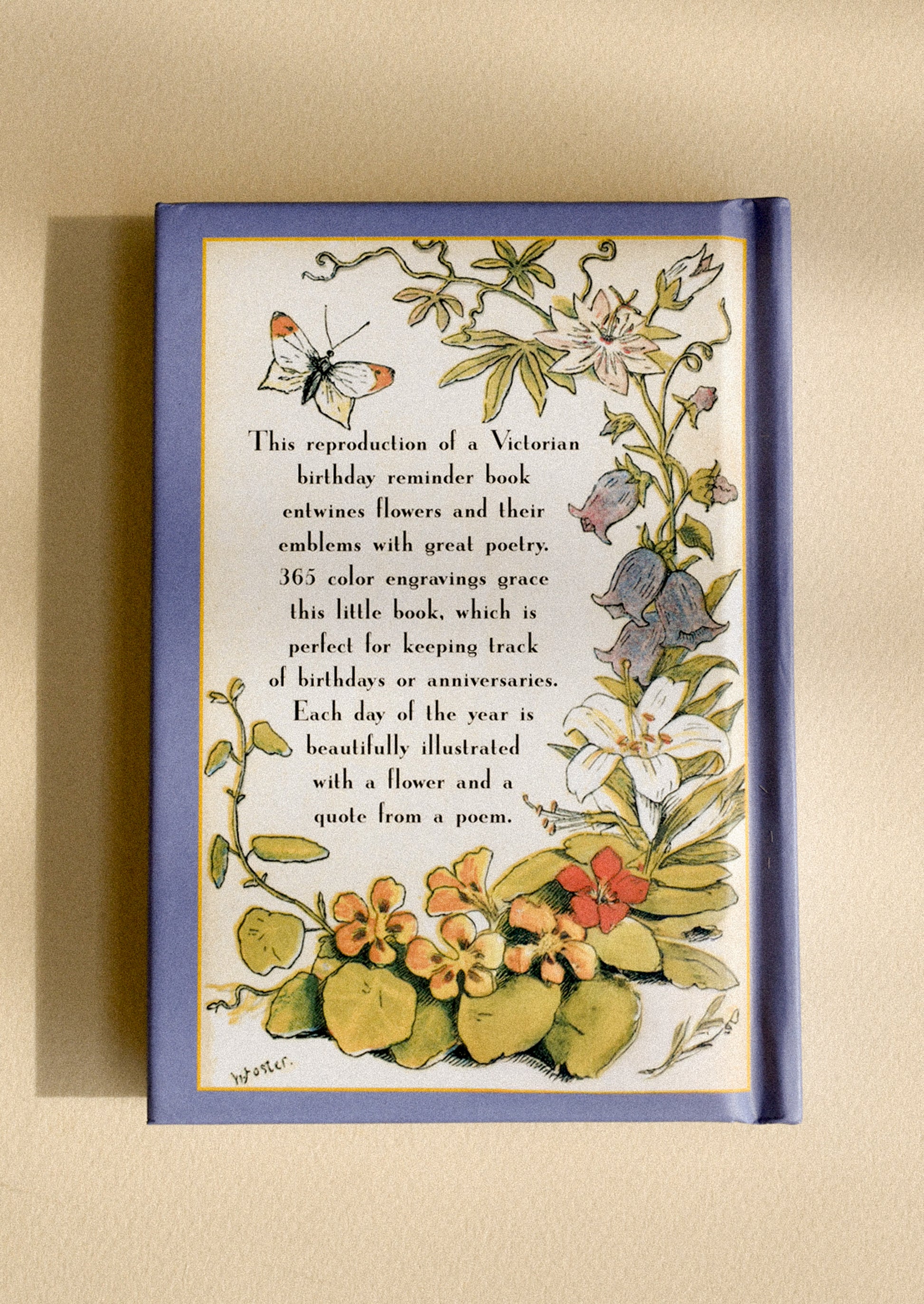 A small book titled "The Floral Birthday Book".