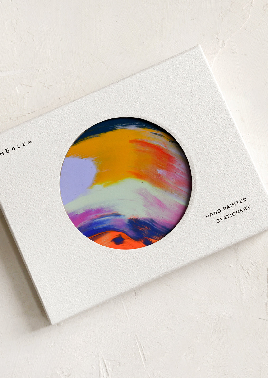 A set of grey greeting cards with brightly hand painted abstract pattern.