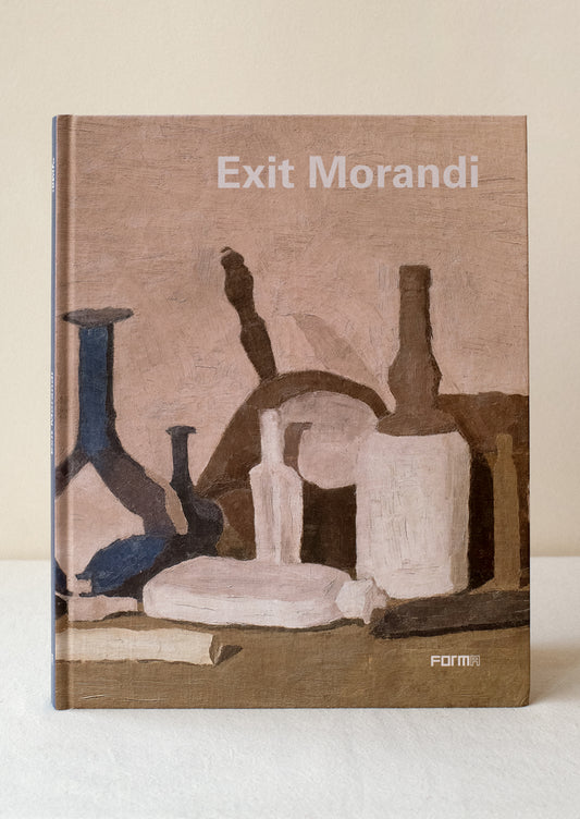 A hardcover coffee table book titled "Exit Morandi".