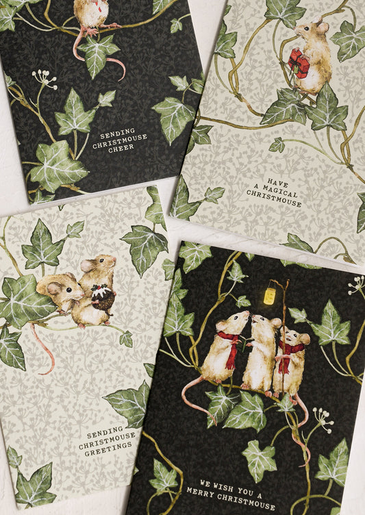 Set of Christmas-themed greeting cards with mice and ivy designs.