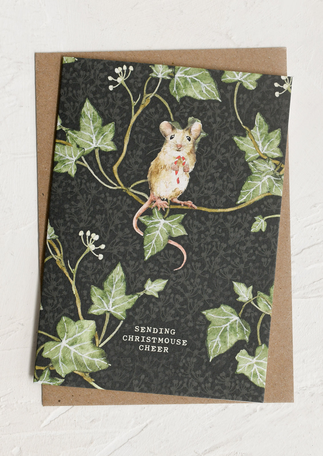 Greeting card with a mouse and ivy design on a dark background