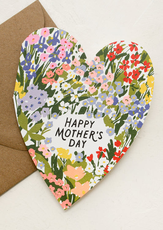 Floral Mother's Day card with a brown envelope on a white background