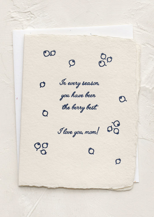 Card with blue text and decorative elements on a textured beige background