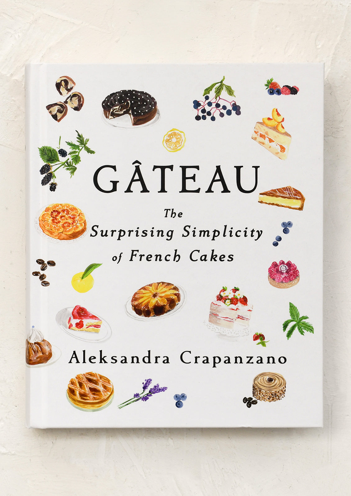 Book cover of 'Gateau: The Surprising Simplicity of French Cakes' by Aleksandra Crapanzano with illustrations of various cakes.