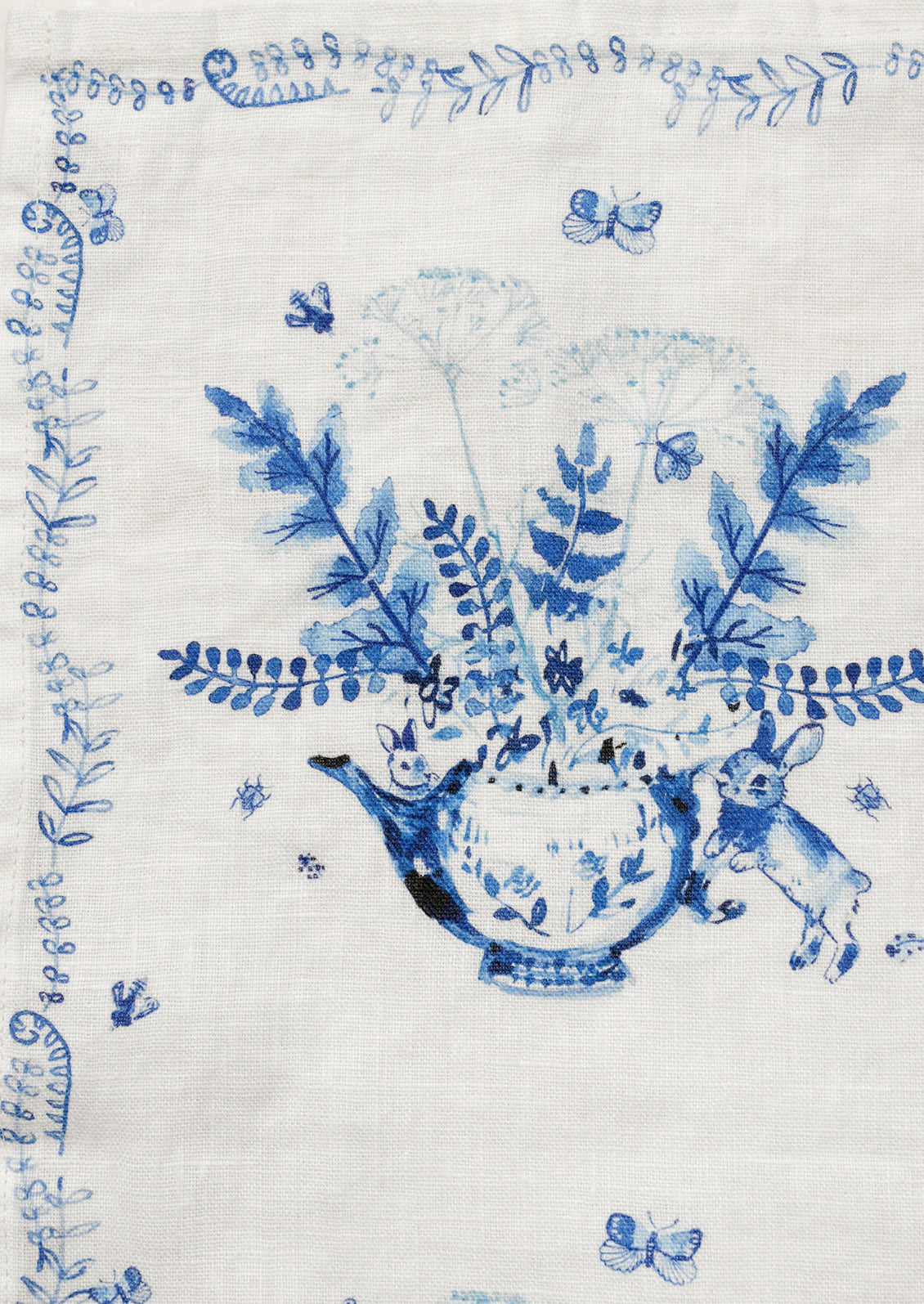 Decorative blue floral and animal pattern on a white background