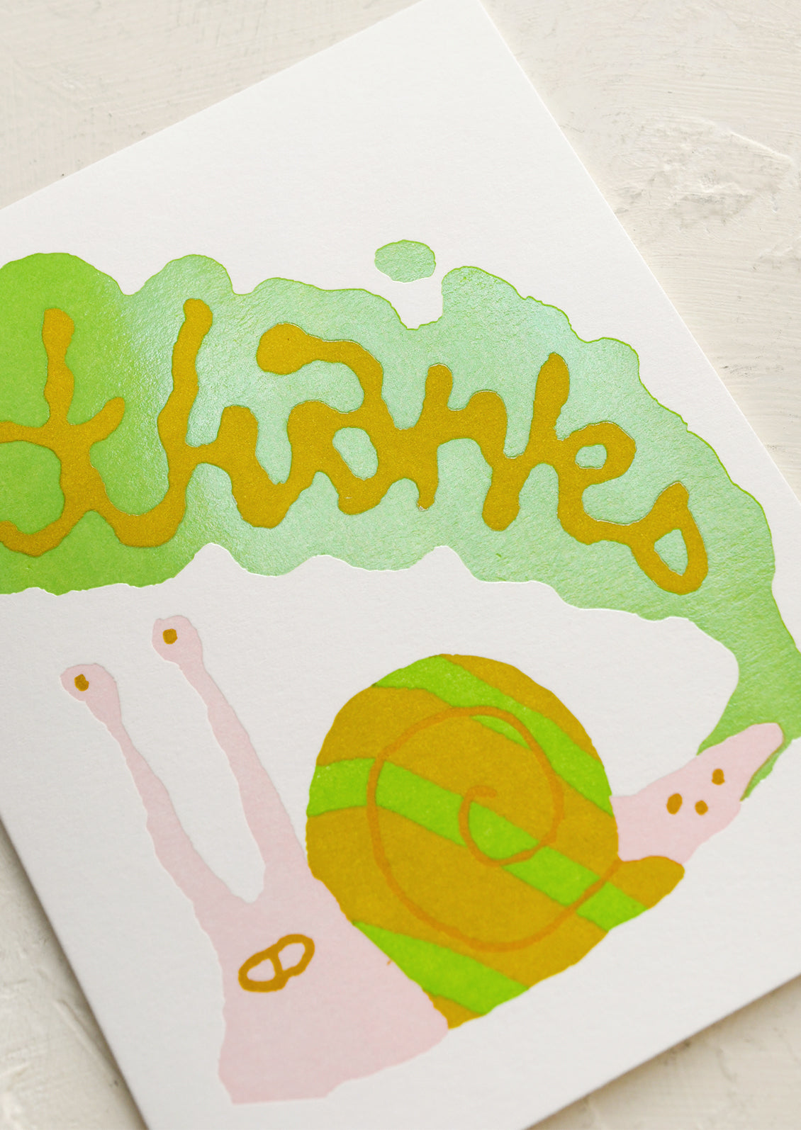Card with a snail illustration and 'Thanks' text on a light background