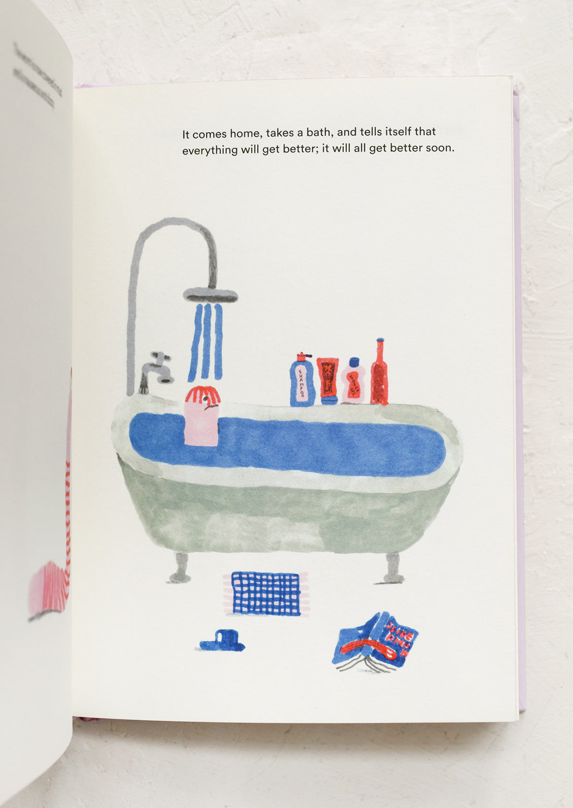 Illustration of a bathtub with various items in a book