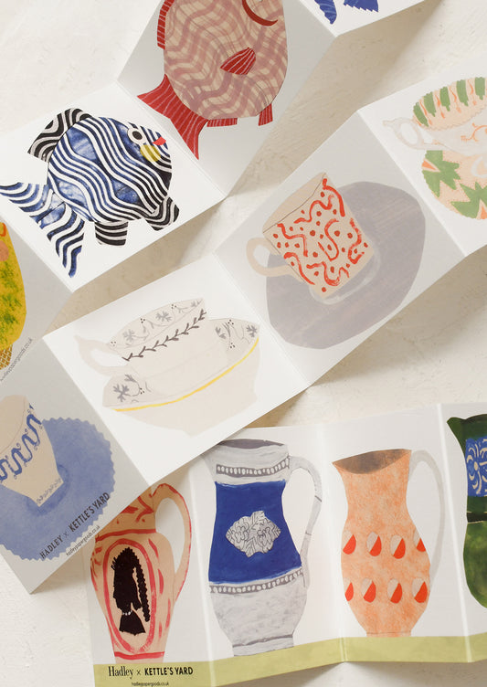 Collection of illustrated greeting cards with various designs on a white background