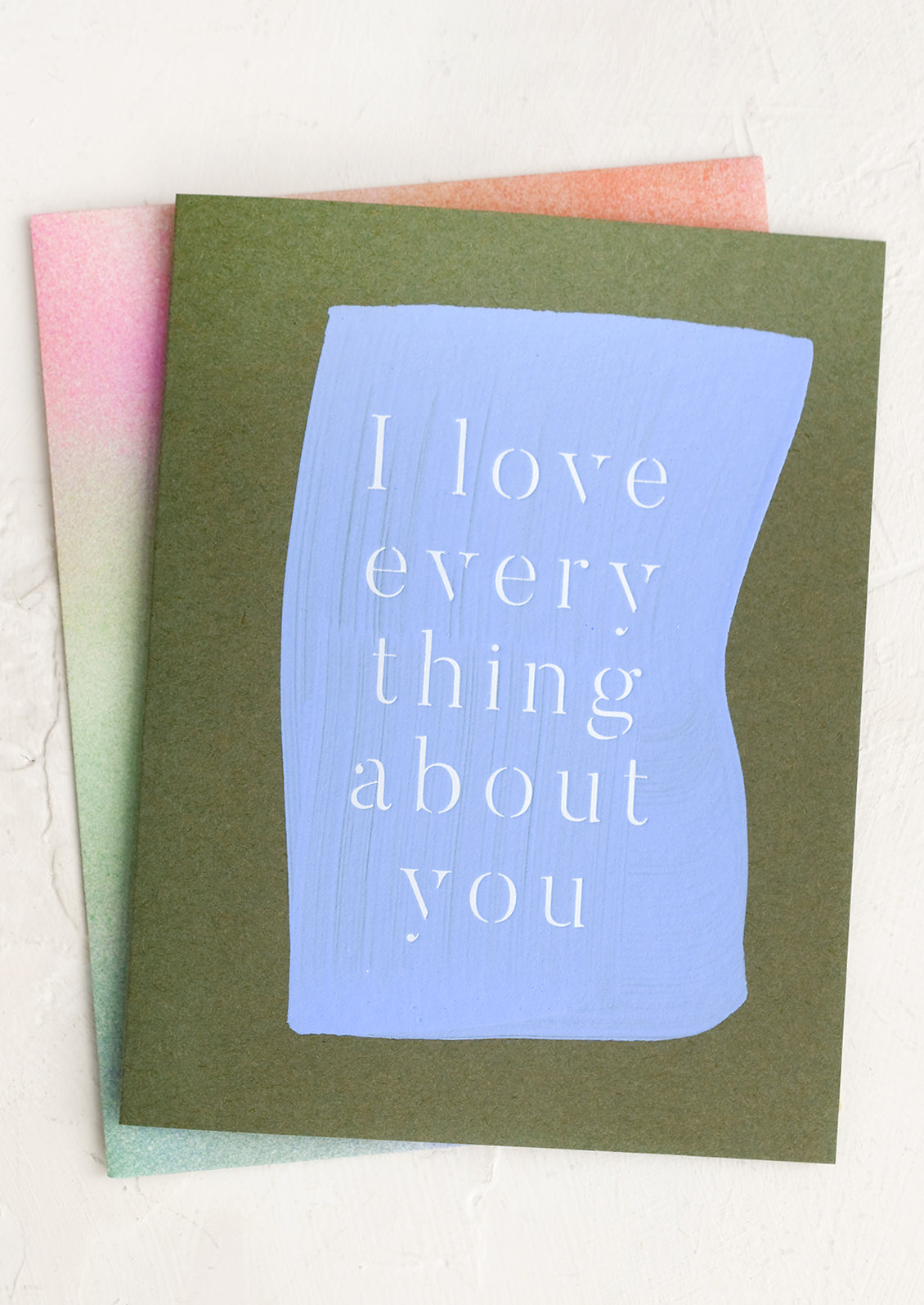 A hand painted card reading "I love everything about you".