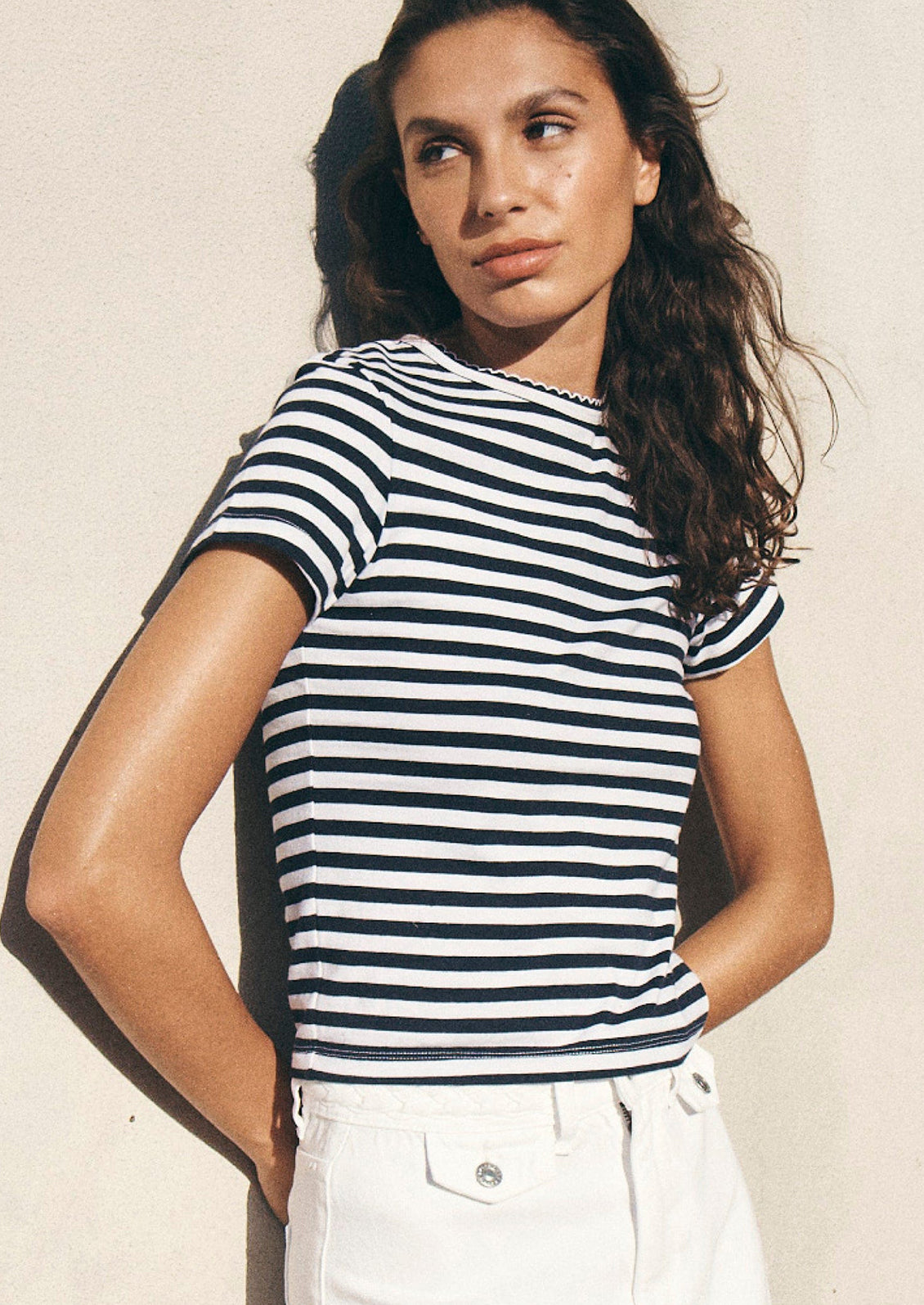 A striped short sleeve t-shirt in navy and white stripes.