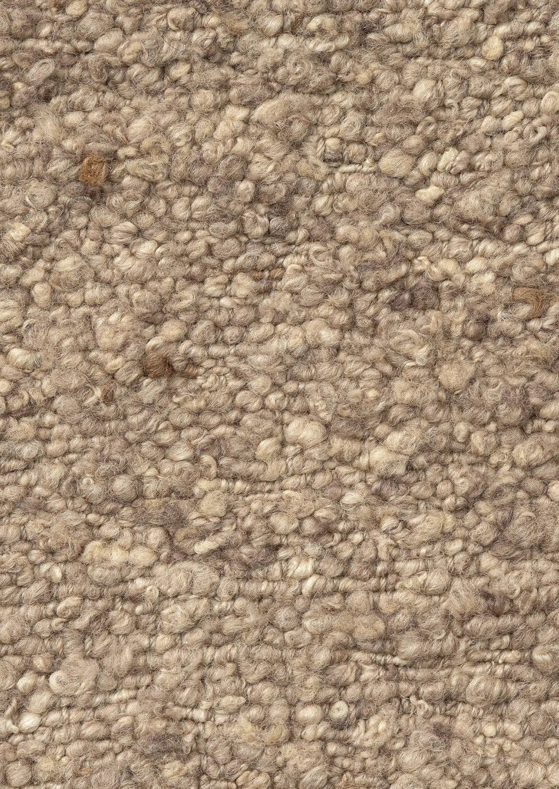Close-up of a textured loop-pile wool fabric in taupe.