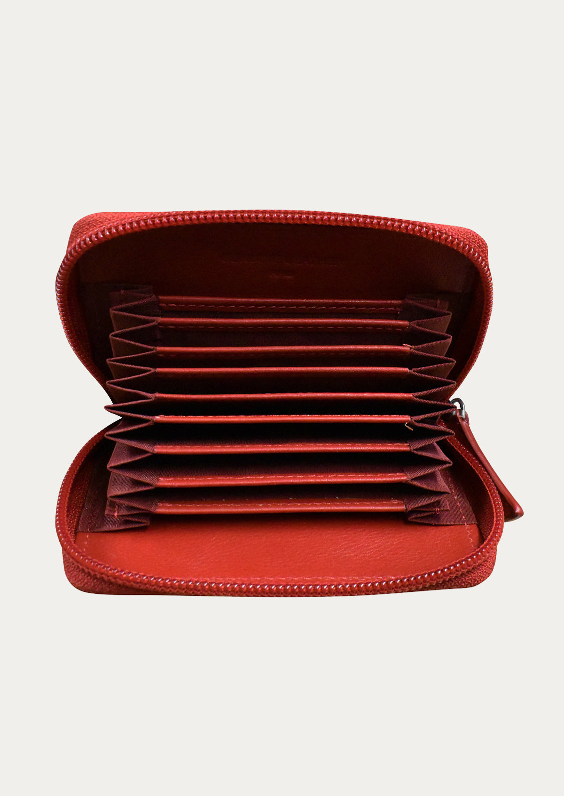 The inside of a leather card holder case showing 10 card slots.