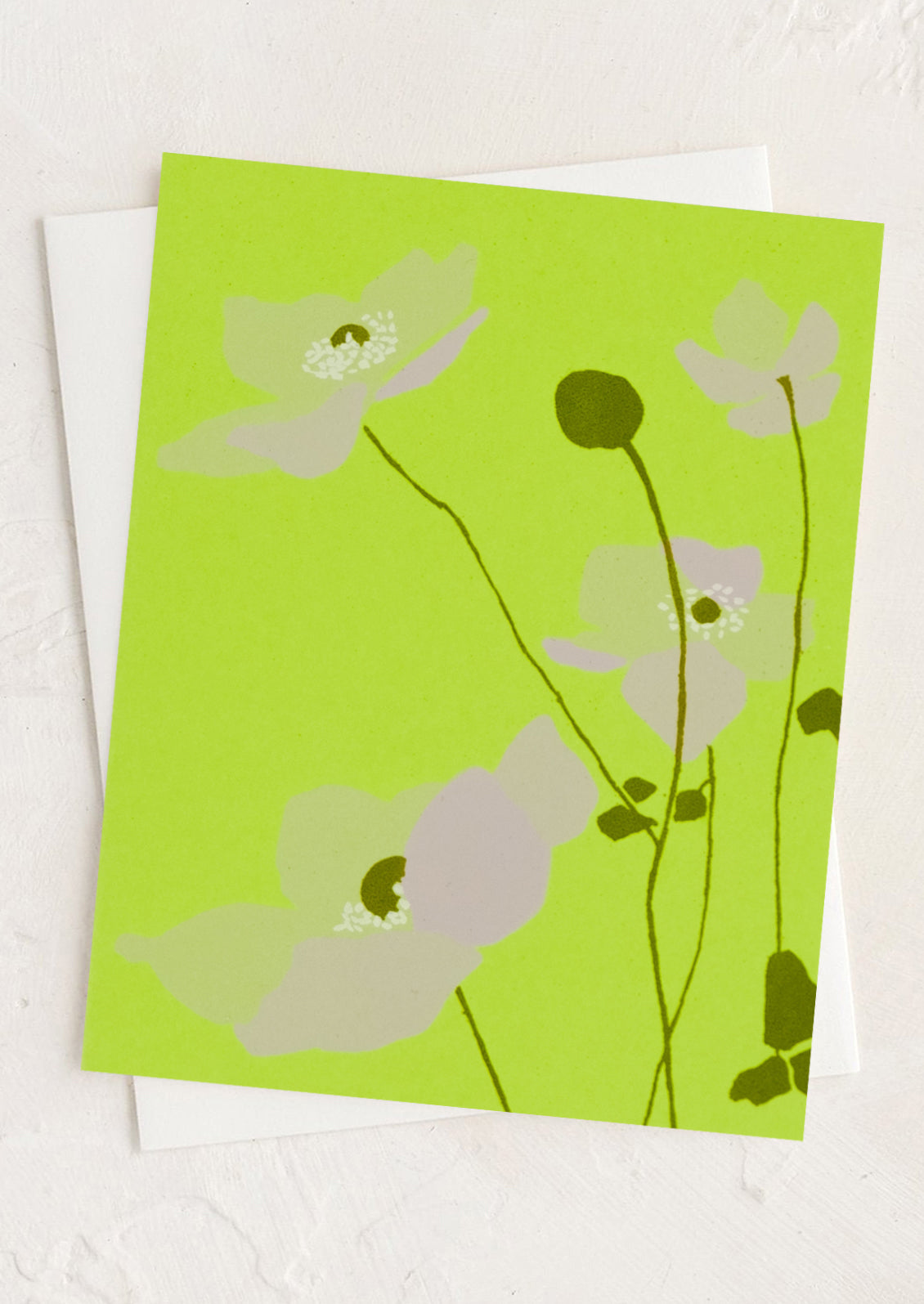 Card with floral design on a green background