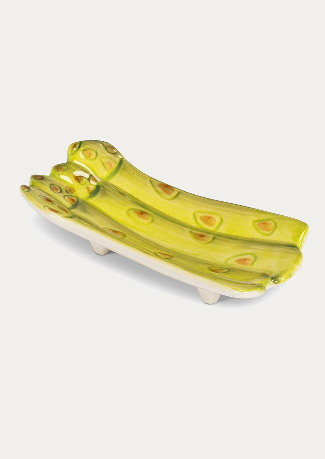 A ceramic dish in the shape of a bunch of asparagus.