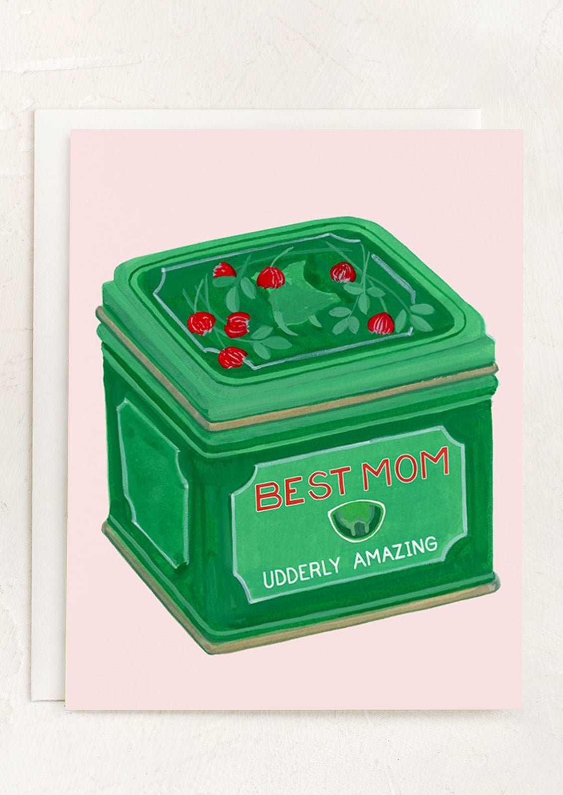 A greeting card with illustration of bag balm tin, text reads "Best Mom Udderly Amazing".