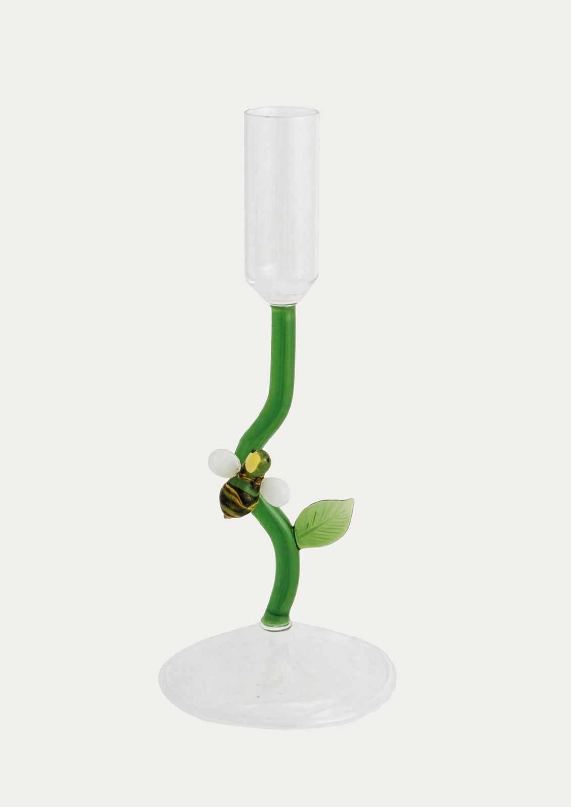 Glass candle holder with green stem and bee design on a white background