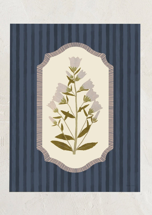 Decorative print with floral design on a blue striped background.