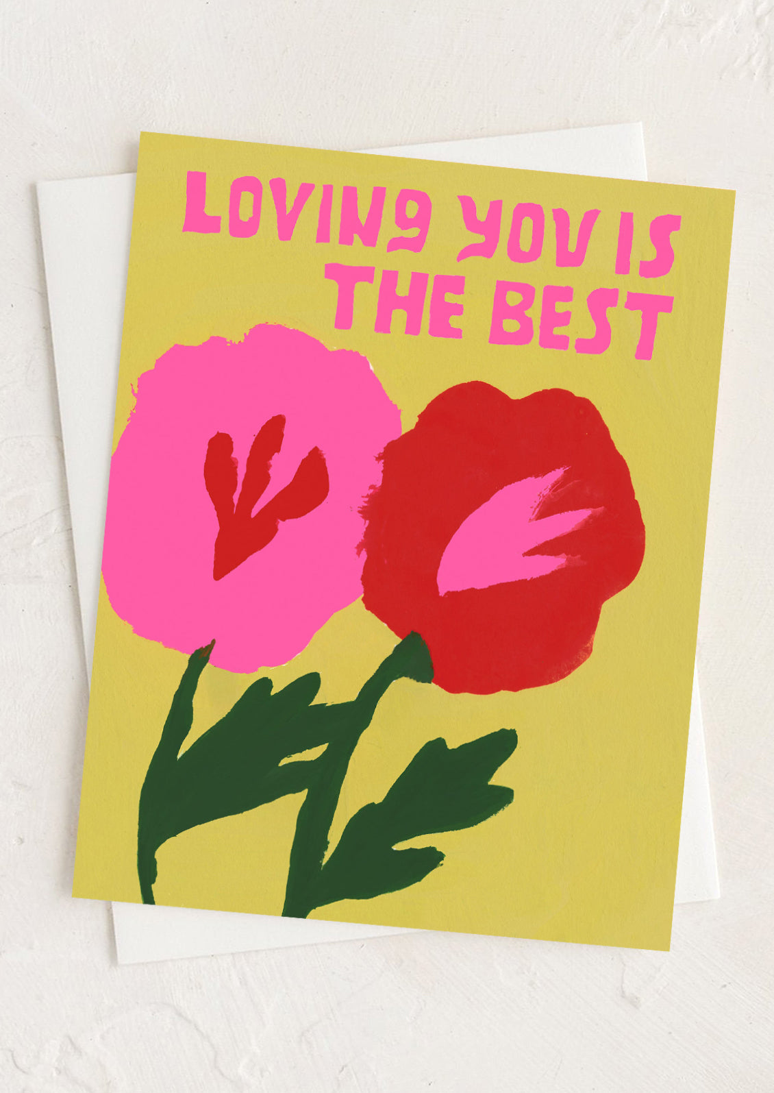 Card with flowers and text 'Loving you is the best' on a yellow background