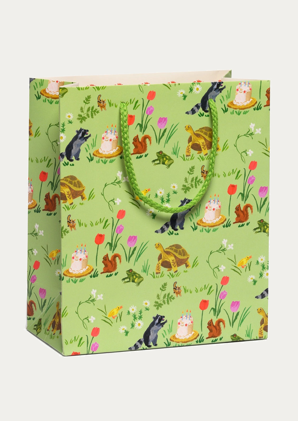 Gift bag with animal and nature pattern on a white background