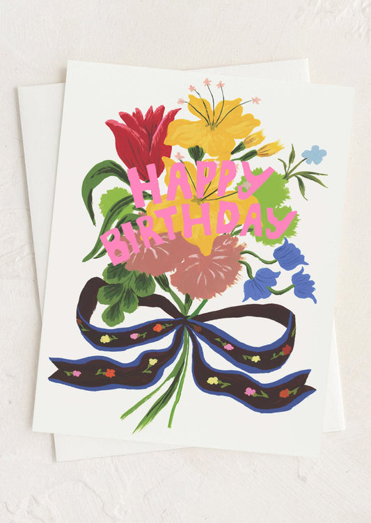 Colorful birthday card with flowers and 'Happy Birthday' text on a white background