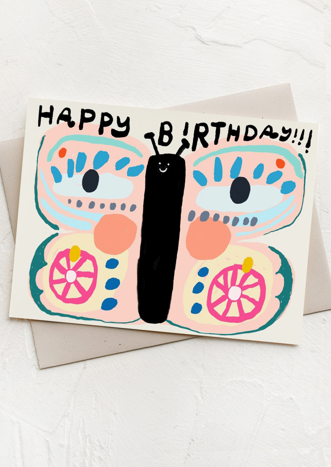 Colorful butterfly-shaped birthday card with 'Happy Birthday' text on a white background