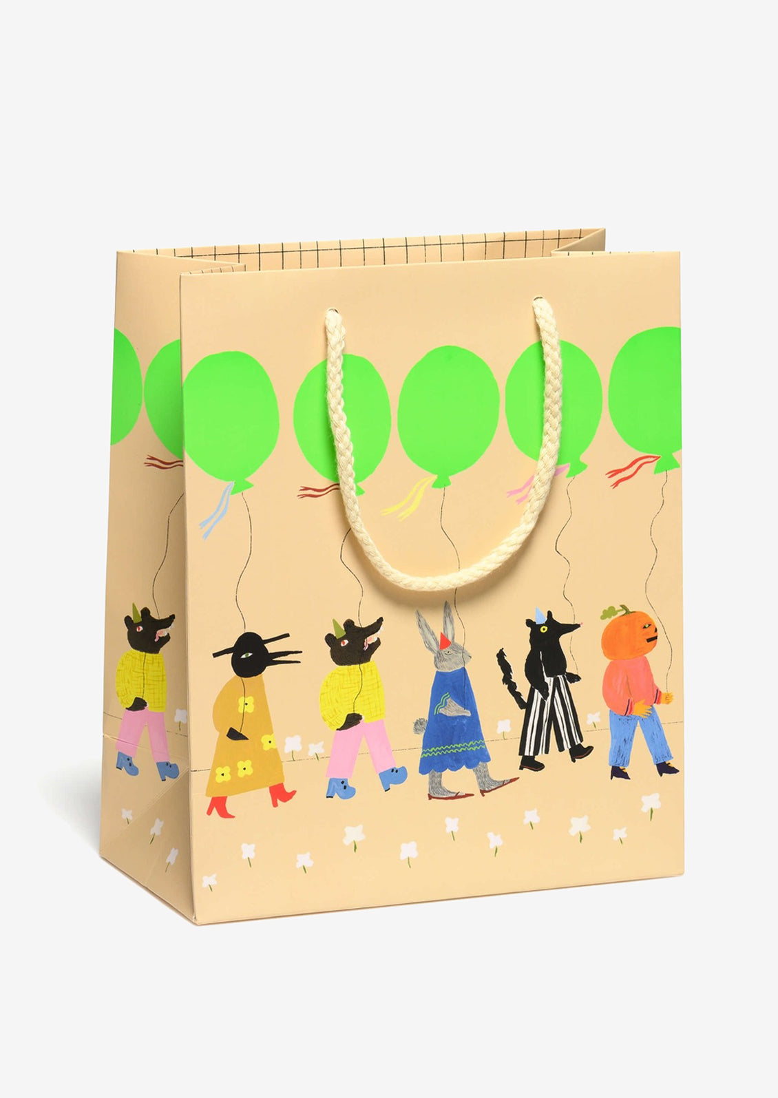 A printed gift bag with graphic illustration of animal parade with neon green balloons.