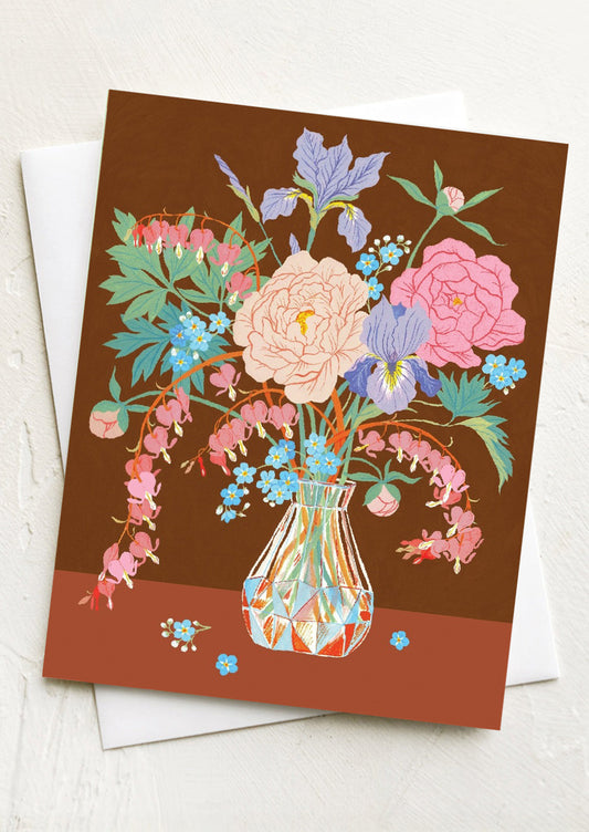 Greeting card with floral design on a brown background