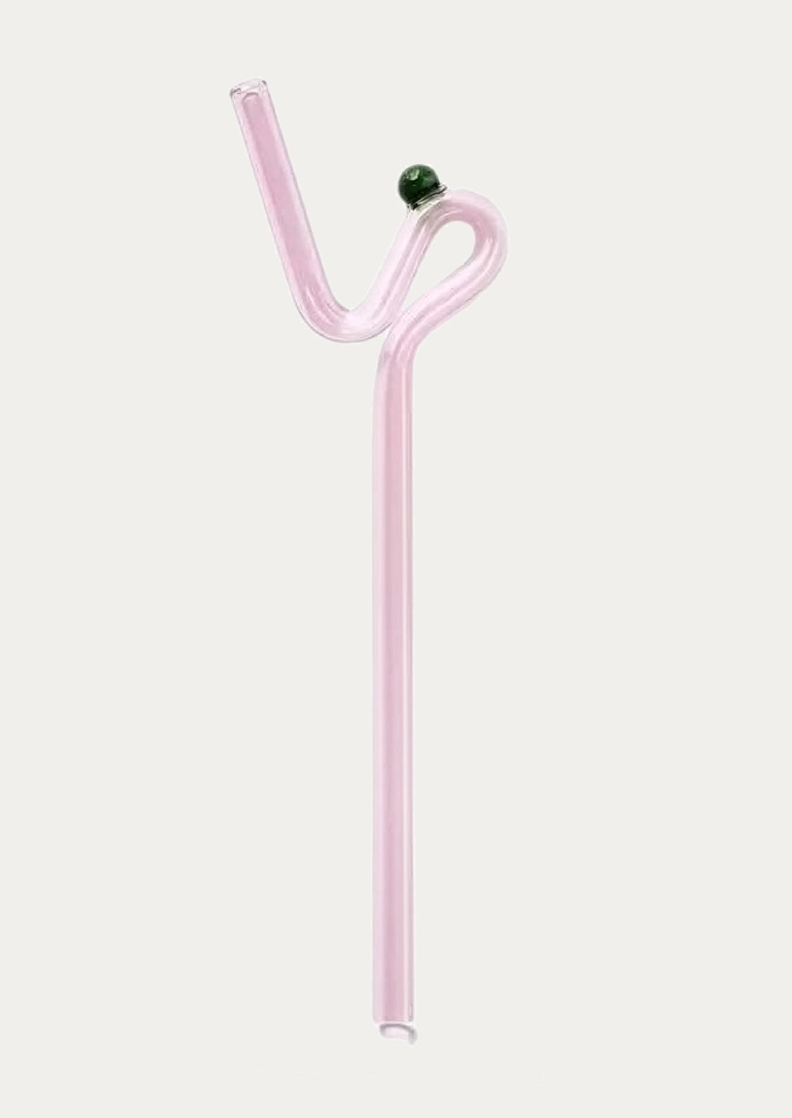 A light pink bent glass straw with a small dark green bead accent at the top, shown on a plain light gray background.