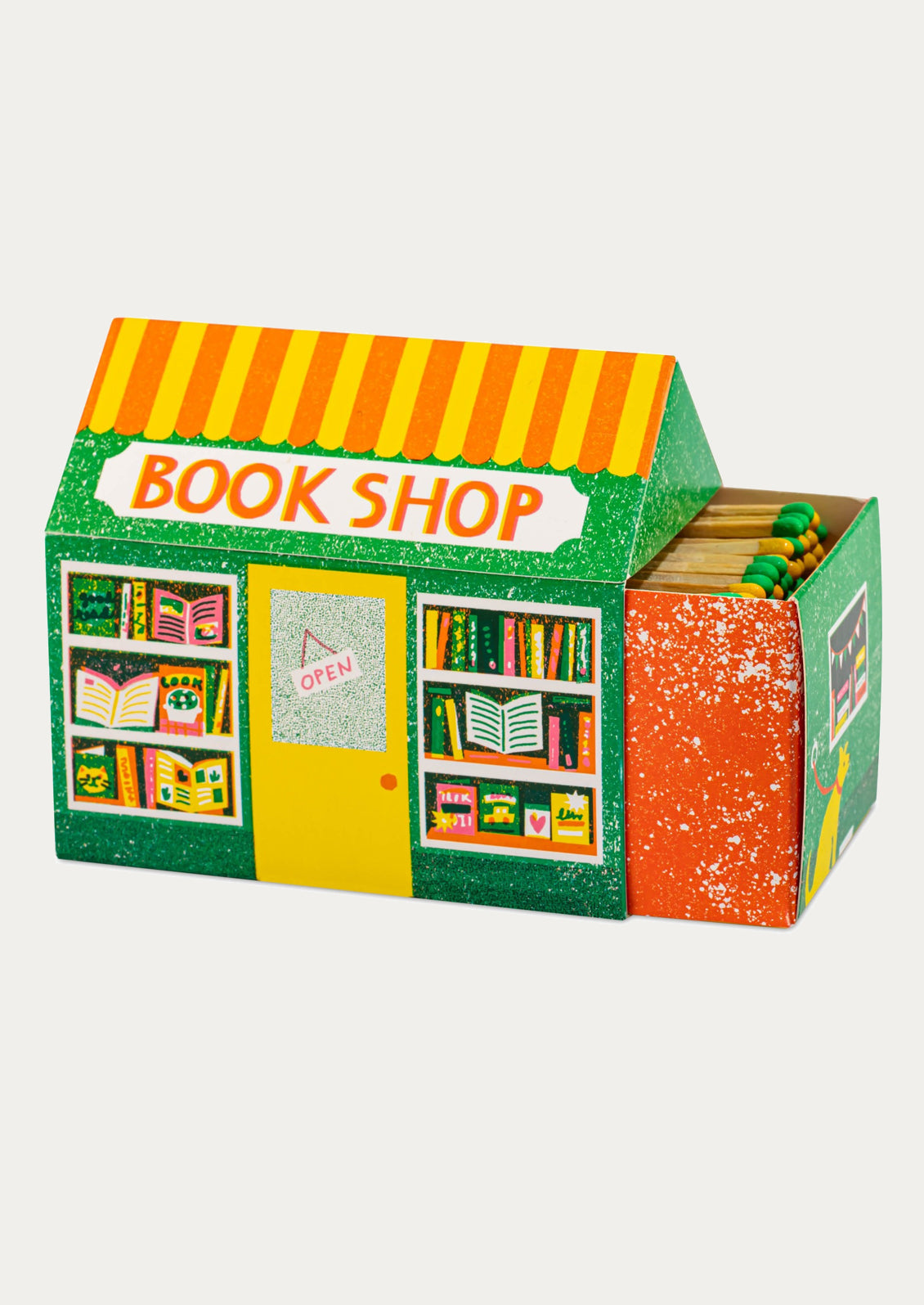 A box of matches shaped like a house, illustrated to depict a book shop.