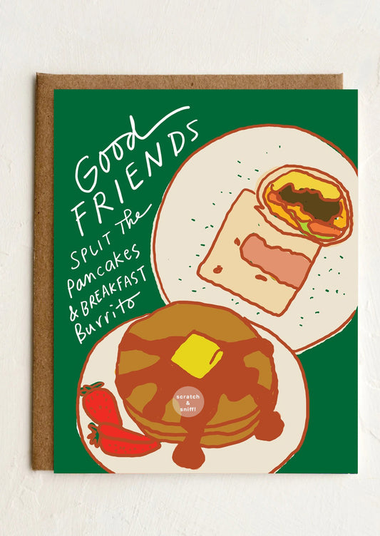 Greeting card with illustration of pancakes, a burrito, and text on a green background