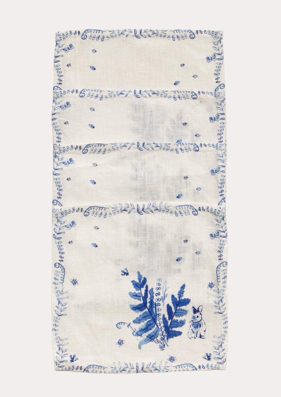 Cocktail Napkin with blue floral design on a white background