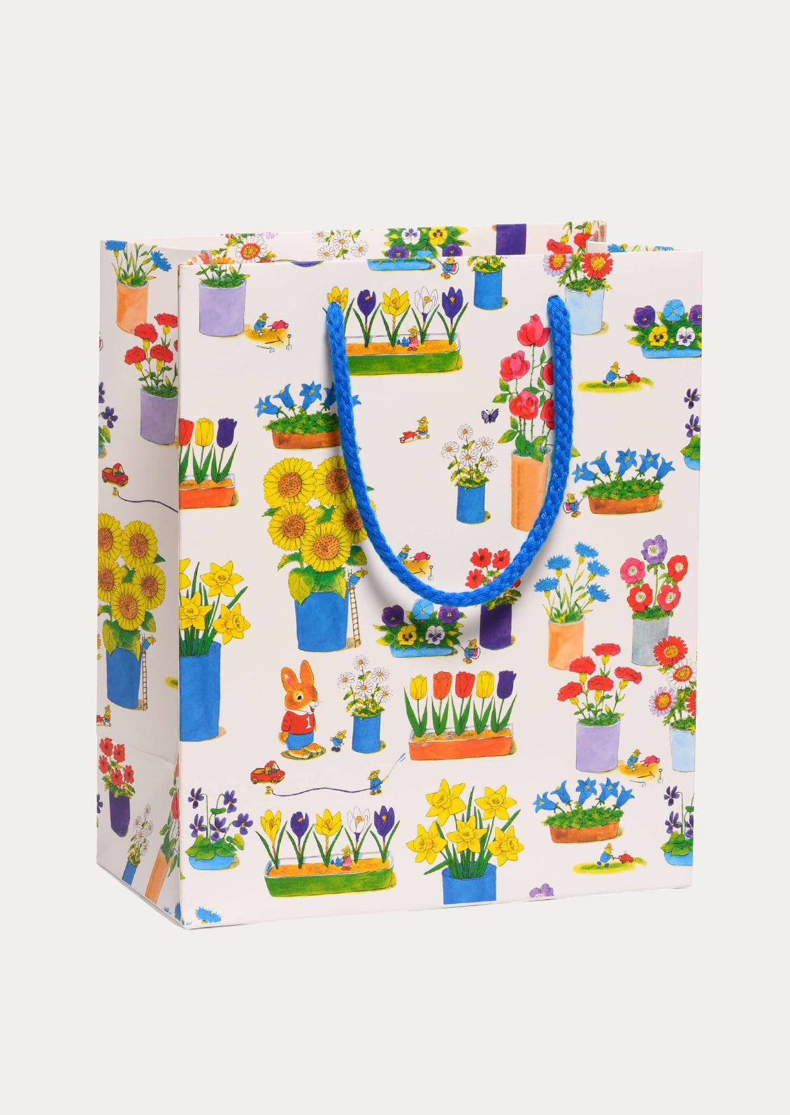 Gift bag with floral and garden design on a white background