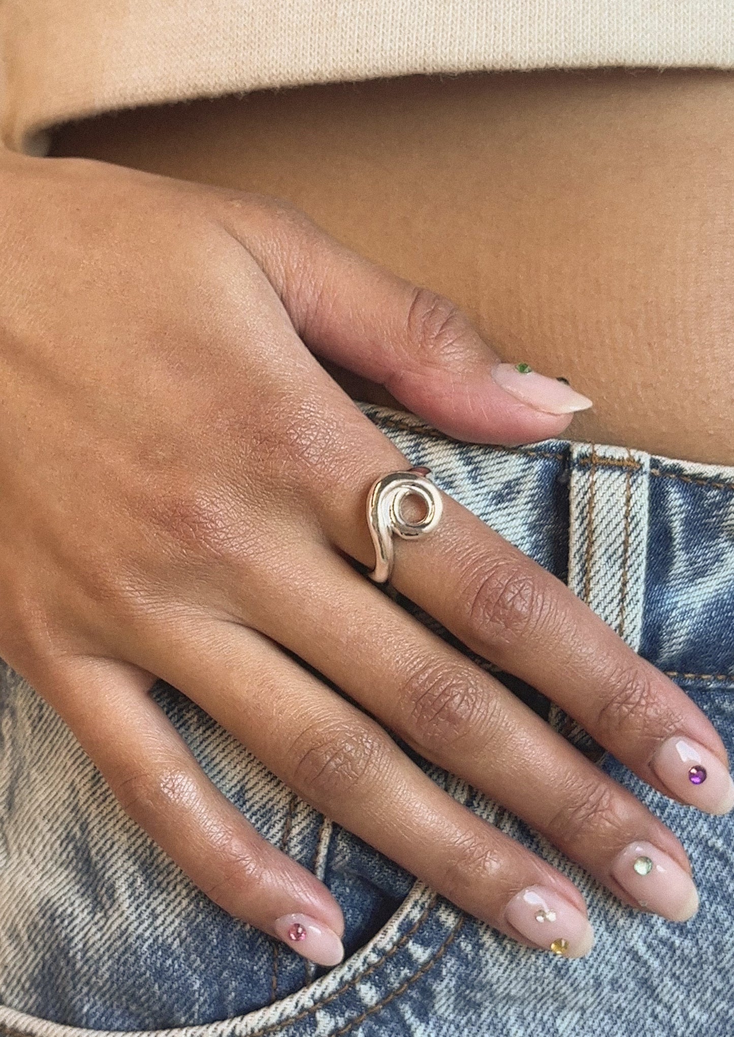 A sterling silver ring in circle shape.